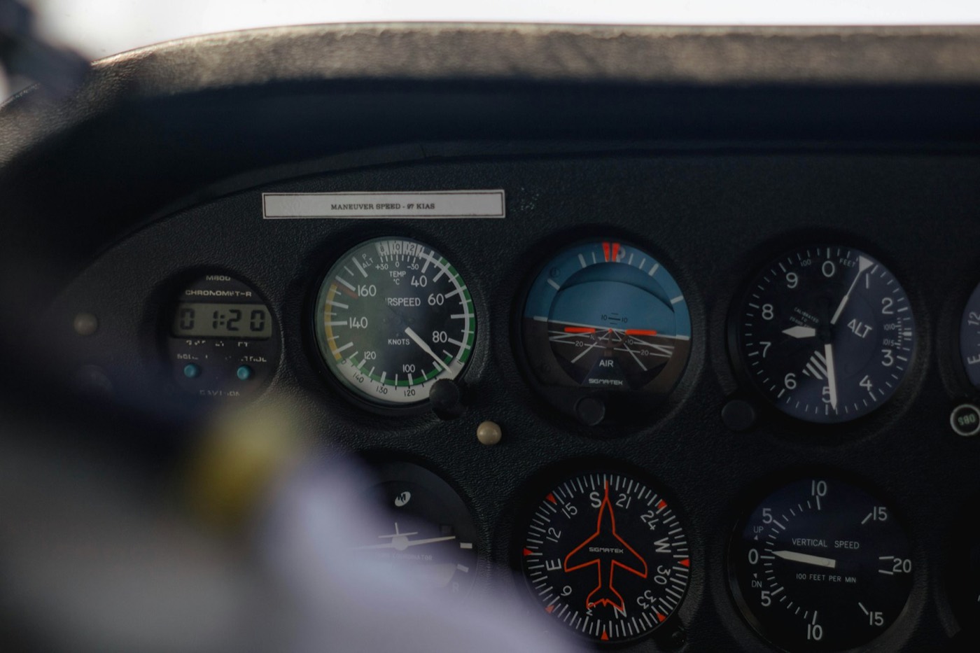 Close-up of a light aircraft instrument panel.